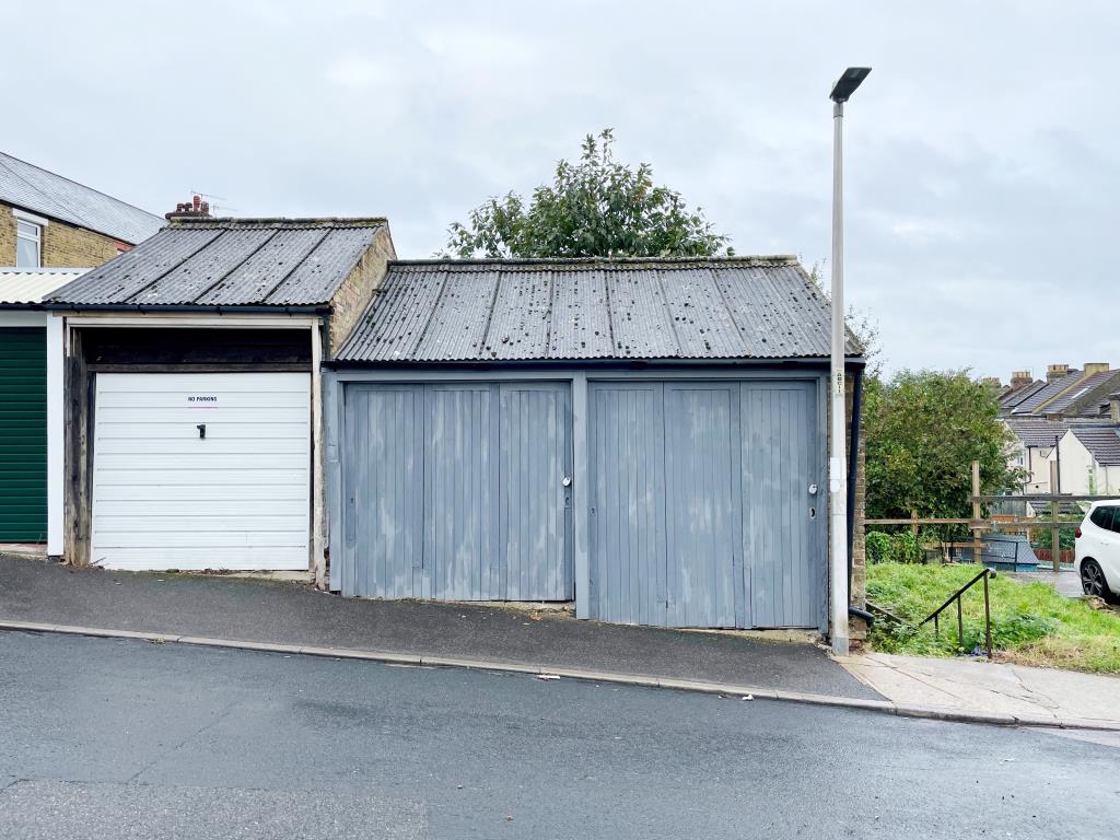 Lot: 109 - A PAIR OF FREEHOLD LOCK-UP GARAGES - Pair of lock up garages